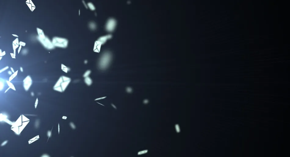 Shattered glass scattering in a dark space with bright light on the left.